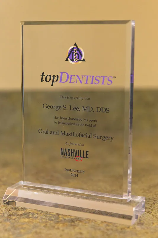 Photo: Dr. Lee - Top Dentist Award, Cumberland Surgical Arts Office Building in Clarksville TN